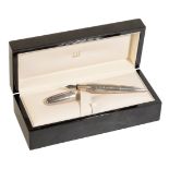 DUNHILL: A SILVER TORPEDO BALLPOINT & DIPPING FOUNTAIN PEN