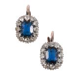 A PAIR OF SYNTHETIC SAPPHIRE AND DIAMOND CLUSTER EARRINGS