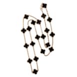 VAN CLEEF & ARPELS: AN ALHAMBRA GOLD AND ONYX ICONIC NECKLACE, CIRCA 1970