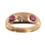 A RUBY AND DIAMOND GYPSY STYLE RING