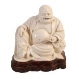 A CHINESE DEHUA "BLANC DE CHINE" BUDAI,