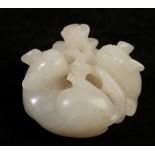 A SMALL WHITE JADE CARVING OF TWO CATS, QING DYNASTY