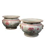 A MAGNIFICENT PAIR OF CHINESE FAMILLE ROSE FISHBOWLS