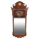 A GEORGE II STYLE WALNUT AND PARCEL-GILT MIRROR