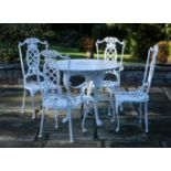 A SET OF FOUR COALBROOKDALE STYLE PAINTED CAST-IRON GARDEN CHAIRS