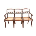 A REGENCY SIMULATED ROSEWOOD BENCH ADAPTED FROM THREE DINING CHAIRS