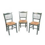A SET OF EIGHT GREEN-PAINTED KITCHEN CHAIRS