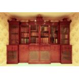 A GEORGE IV MAHOGANY BREAKFRONT SECRETAIRE BOOKCASE