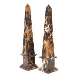 A PAIR OF PORTORO MARBLE OBELISKS