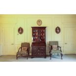 A GEORGE III STYLE MAHOGANY LIBRARY ARMCHAIR