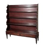 A VICTORIAN MAHOGANY OPEN 'WATERFALL' BOOKCASE