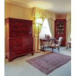 A NEAR PAIR OF GEORGE III MAHOGANY CHEST-ON-CHESTS