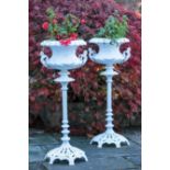 A PAIR OF COALBROOKDALE STYLE CAST IRON JARDINIERE