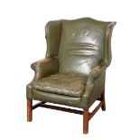 A GEORGE III STYLE MAHOGANY WING ARMCHAIR