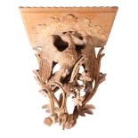 A GEORGE II CARVED SOFTWOOD WALL BRACKET