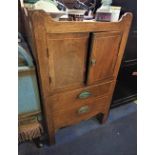 A GEORGE III MAHOGANY COMMODE