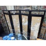 AN ORIENTAL HARDWOOD FRAMED FOUR FOLD SCREEN