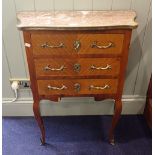 A FRENCH MARBLE TOP COMMODE