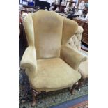 A GEORGE II STYLE WING CHAIR