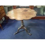 A GEORGE III MAHOGANY TILT-TOP TRIPOD TABLE