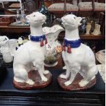 A PAIR OF FAIENCE POTTERY STYLE GREYHOUNDS