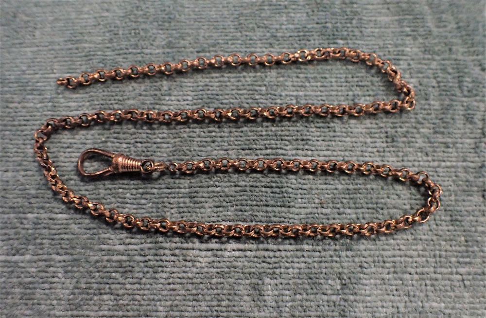 AN YELLOW METAL POCKET WATCH CHAIN