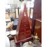 A MAHOGANY CHEST OF GRADUATED DRAWERS