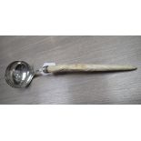 A SILVER LADLE