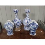 A PAIR OF DUTCH DELFTWARE BLUE AND WHITE VASES