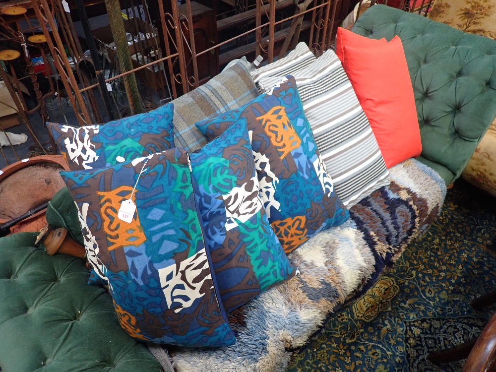 A COLLECTION OF SCATTER CUSHIONS, SOME MADE FROM 1960s MATERIAL