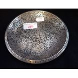 A PERSIAN CAST METAL DISH, WITH ALL OVER DECORATION IN 16TH CENTURY MANNER