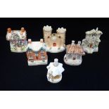 A COLLECTION OF VICTORIAN STAFFORDSHIRE 'COTTAGE' PASTILLE BURNERS (6)