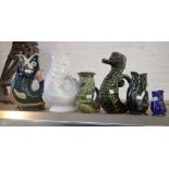 A COLLECTION OF GLAZED GURGLE FISH JUGS