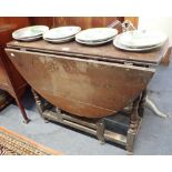 A 17TH CENTURY OAK GATELEG TABLE