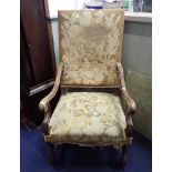 A FRENCH WALNUT FRAMED ARMCHAIR