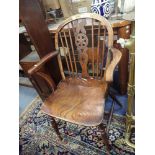 A 19TH CENTURY WINDSOR WHEELBACK ARMCHAIR