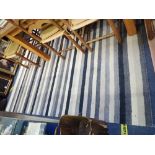 A MODERN GREY STRIPED RUG