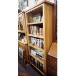 A CONTEMPORARY PALE OAK BOOKCASE