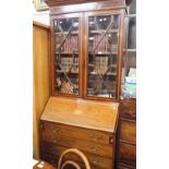 AN EDWARDIAN MAHOGANY BUREAU BOOKCASE