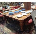 A VICTORIAN OAK EXTENDING TABLE