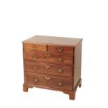 A GEORGE III MAHOGANY AND CROSSBANDED CHEST OF DRAWERS