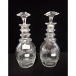 A PAIR OF GEORGE III CUT GLASS DECANTERS