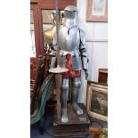 A REPRODUCTION FULL SIZE SUIT OF ARMOUR