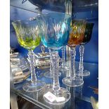 A SET OF SIX MULTI-COLOURED WINE GOBLETS