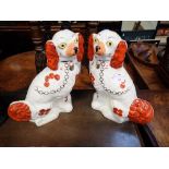 A PAIR OF REPRODUCTION STAFFORDSHIRE DOGS