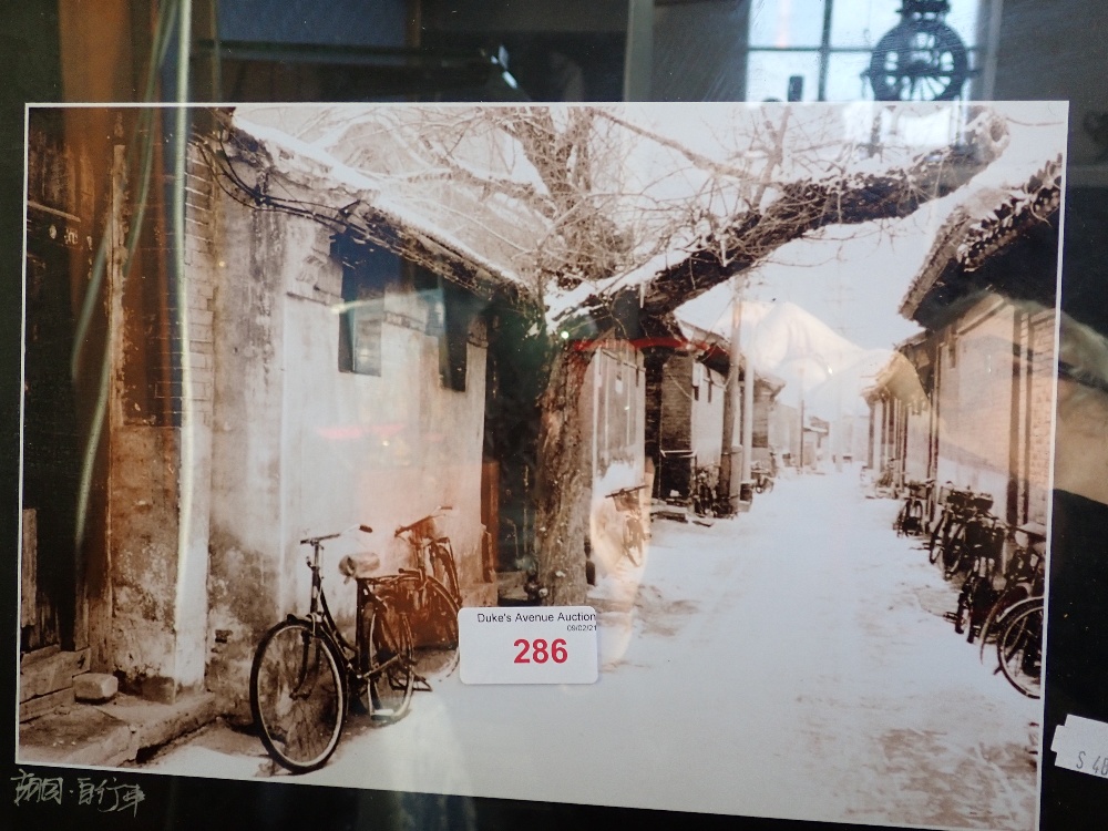 A PAIR OF FRAMED PHOTOGRAPHS OF TIBET