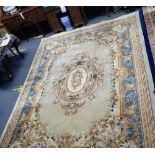 A LARGE CREAM GROUND CHINESE RUG