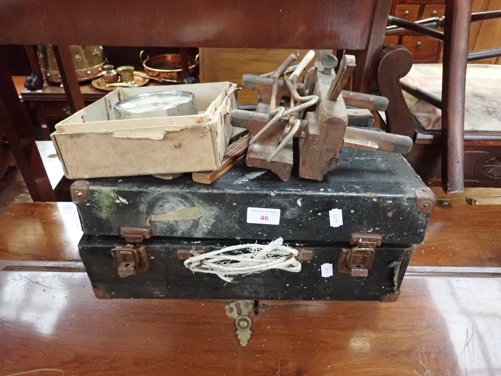 A VINTAGE TOOL BOX CONTAINING TOOLS