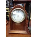 AN EDWARDIAN MAHOGANY CASED MANTEL CLOCK