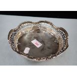 A SILVER FOOTED PIERCED DISH